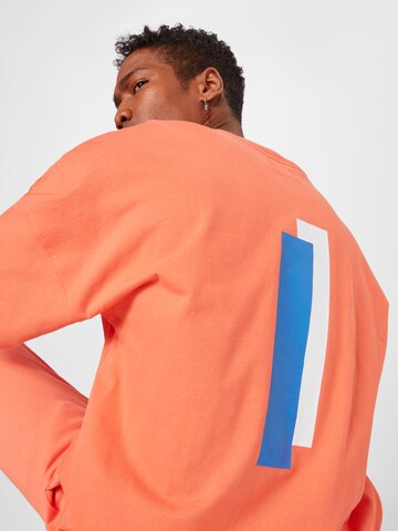 ABOUT YOU x Mero T-shirt 'Kelkid' i orange