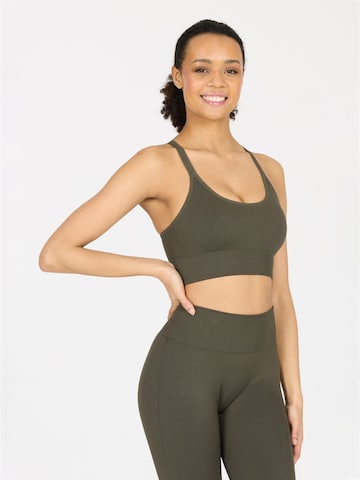Athlecia - Bustier Sujetador deportivo 'Foan V3 Seamless' en verde: frente