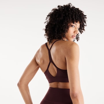 new balance Bralette Sports bra 'Essential Yoga Bra' in Red