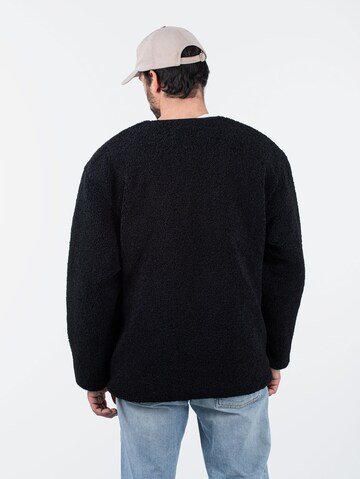 Carhartt WIP Übergangsjacke 'Devin Liner' in Schwarz