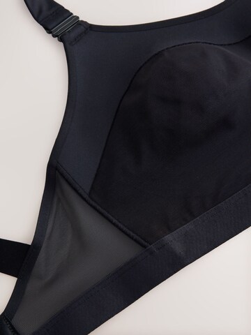 Bustino Reggiseno sportivo 'Zero Bounce' di Next in nero