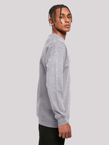 Sweat-shirt 'SELF CARE' F4NT4STIC en gris