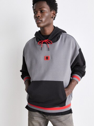 Sweat-shirt 'Dicheck' HUGO en gris