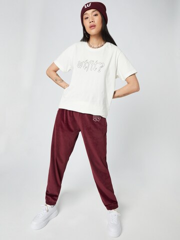 Tapered Pantaloni 'Dominic' di ABOUT YOU x Dardan in rosso