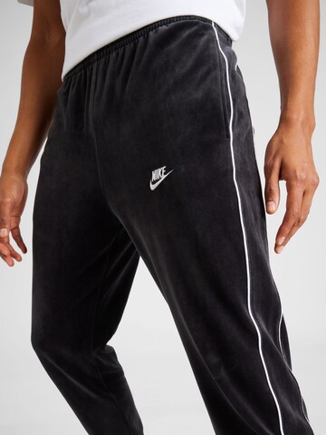 Nike Sportswear Tapered Trousers in Black