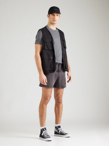 Loosefit Pantalon Champion Authentic Athletic Apparel en noir