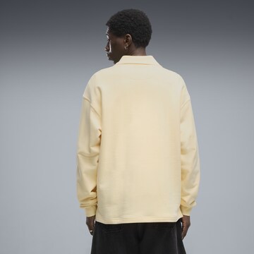 PUMA Functioneel shirt 'Essentials Elevated No. 1' in Geel