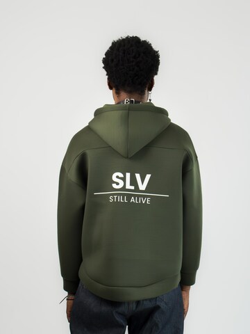 STILL ALIVE - Pullover oversized 'Essential' em verde