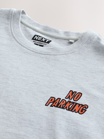 T-Shirt Next en gris