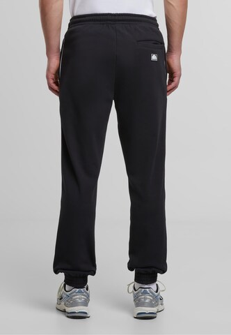 Tapered Pantaloni di SOUTHPOLE in nero