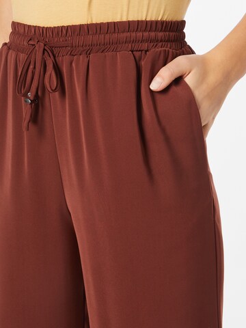 ABOUT YOU Loose fit Trousers 'Ida' in Brown