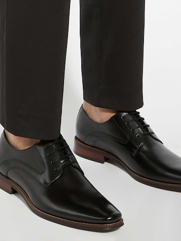 Chaussure à lacets 'Stoney' Dune LONDON en noir