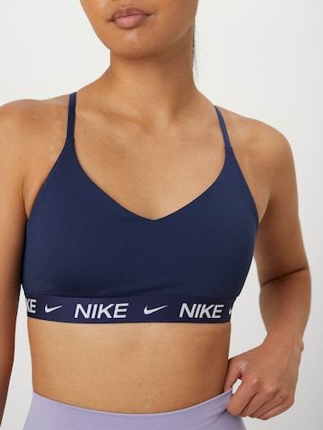 Bustier Soutien-gorge de sport 'INDY' NIKE en bleu