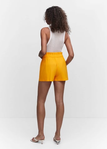 MANGO Normální Kalhoty se sklady v pase 'Paper' – žlutá