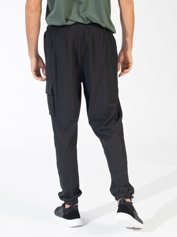 Regular Pantaloni sport de la Spyder pe negru