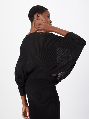 Pull-over Sisley en noir