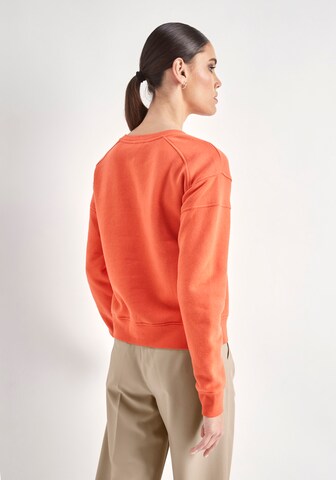 HECHTER PARIS Sweatshirt in Orange