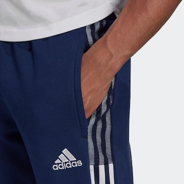 ADIDAS SPORTSWEAR - Tapered Calças de desporto 'Tiro 21 Sweat' em azul