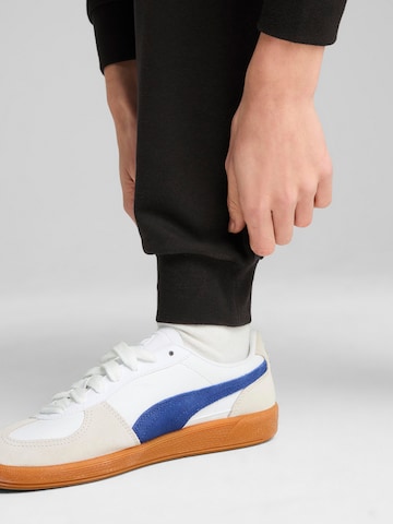 PUMA Trainingspak in Zwart