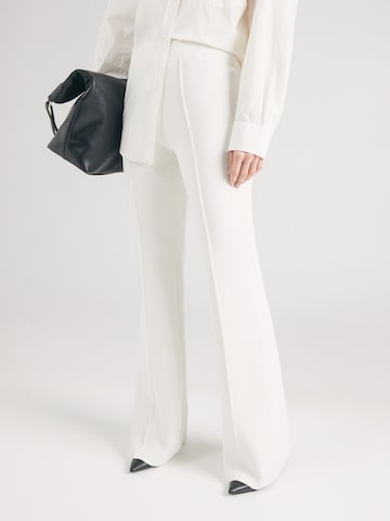REMAIN Wide leg Trousers in White: front