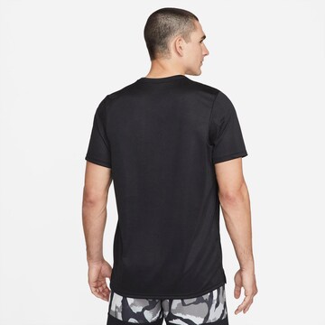 NIKE - Camiseta funcional 'Sport Clash' en negro