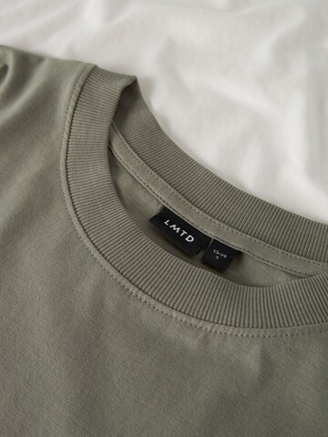 Maglietta di LMTD in verde