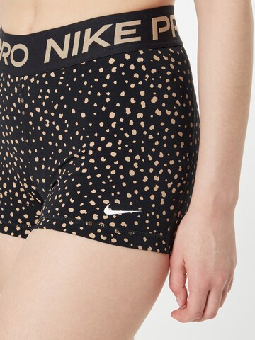 NIKE Skinny Sporthose in Schwarz