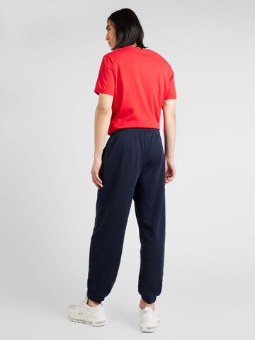 Champion Authentic Athletic Apparel Tapered Trousers in Blue