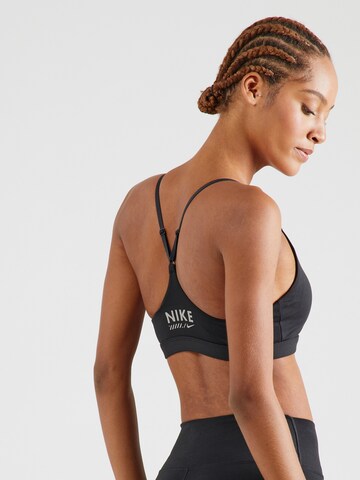 Bustino Reggiseno sportivo 'INDY' di NIKE in nero