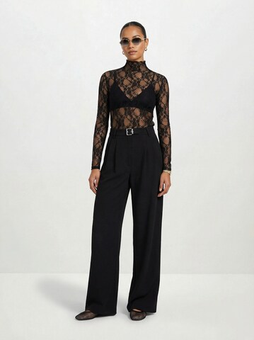 Hoermanseder Regular Pleat-front trousers in Black