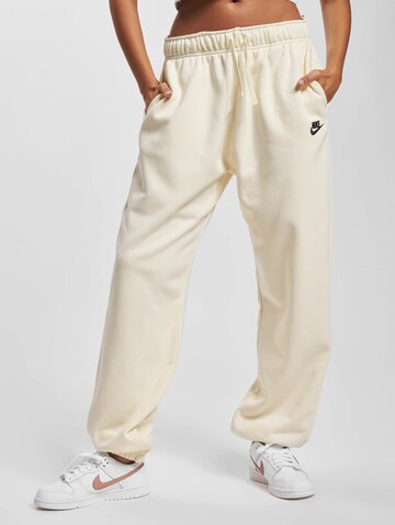 NIKE Regular Pants in Yellow: front