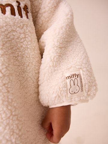 Next Fleecetakki värissä beige