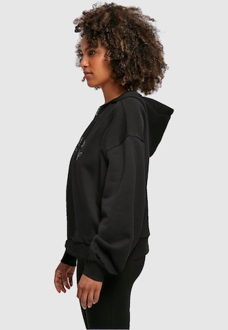 Sweat-shirt 'Spring - Rose' Merchcode en noir