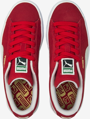 Baskets PUMA en rouge