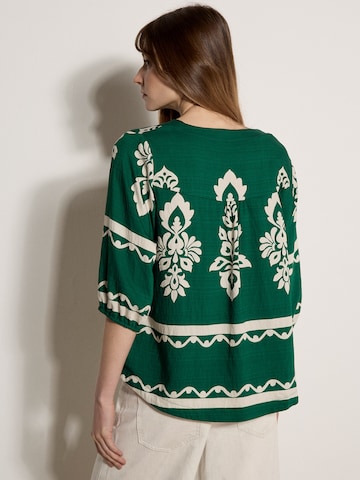 Chemisier Apricot en vert