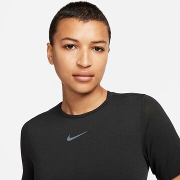 NIKE Funktionsshirt 'SWIFT' in Schwarz