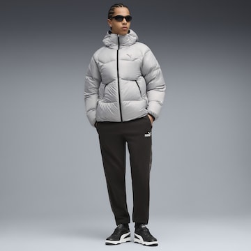PUMA Tapered Sports trousers 'Essentials' in Black