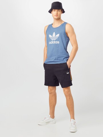 Maglietta di ADIDAS ORIGINALS in blu