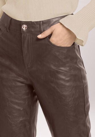 Cartoon Loose fit Trousers in Brown