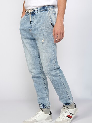 KOROSHI Tapered Jeans in Blau