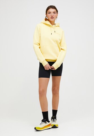 Sweat-shirt PEAK PERFORMANCE en orange : devant