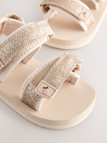 Next - Sandalias en oro