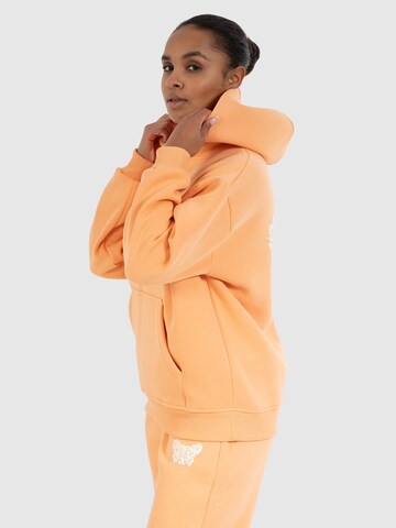 Veste de survêtement ' Nala ' Smilodox en orange