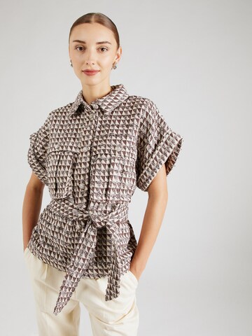 minus Vest i brun: forside