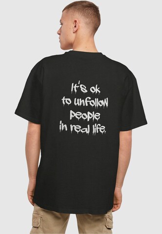 Merchcode Shirt 'Unfollow' in Black