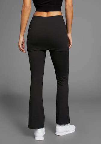 FAYN SPORTS Flared Leggings in Black