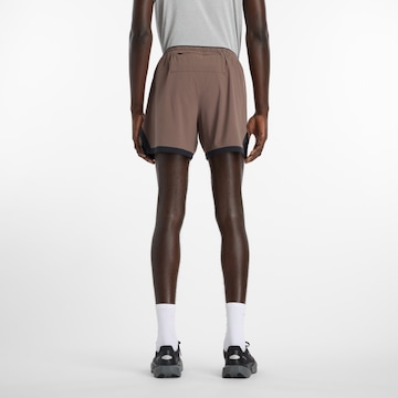 new balance Loosefit Sportbroek 'Essential' in Bruin