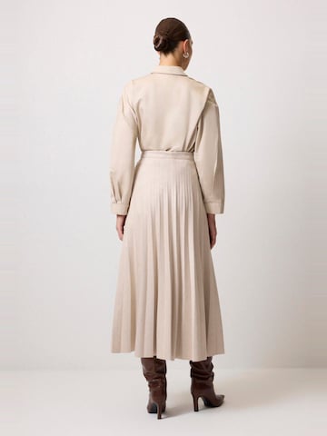 Touche Prive Rock in Beige