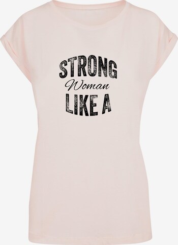 Merchcode T-Shirt 'WD - Strong Like A Woman' in Pink: predná strana