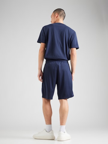 Loosefit Pantalon Champion Authentic Athletic Apparel en bleu